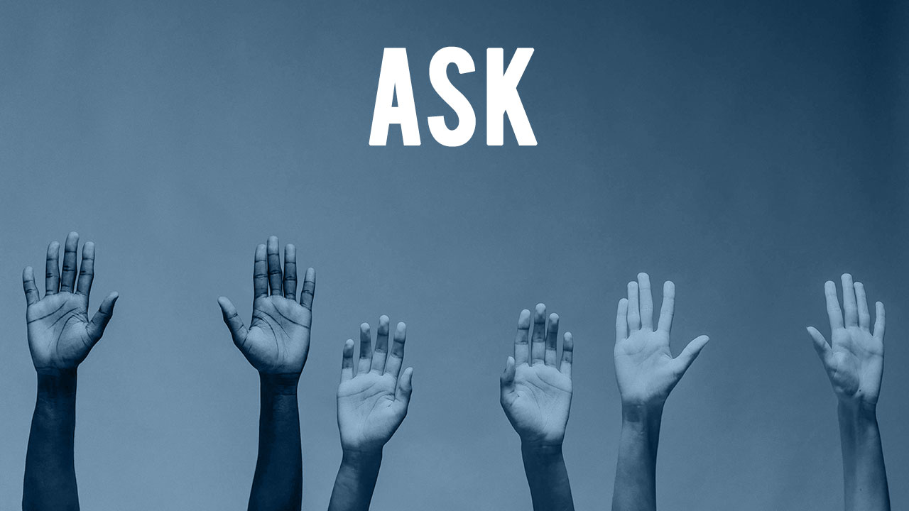 the word "ASK" overlayed upon an image of a group of hands raised